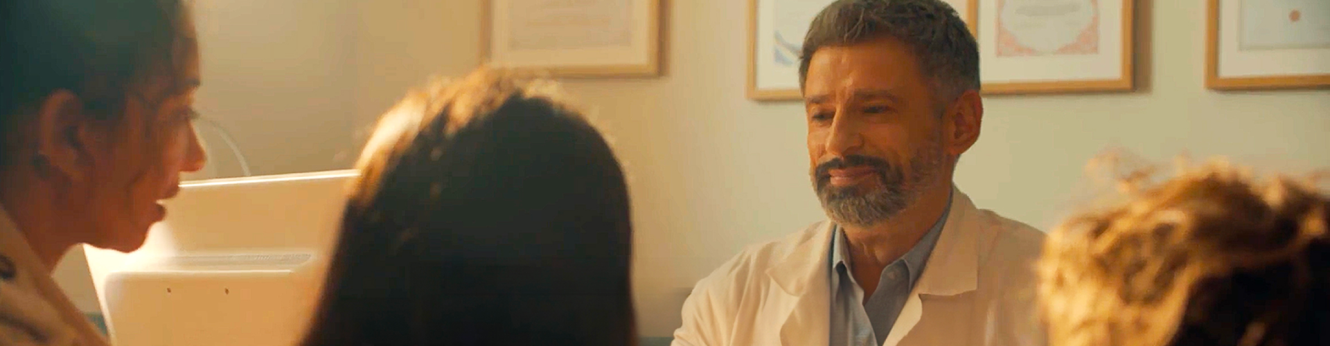 Doctor talking to family